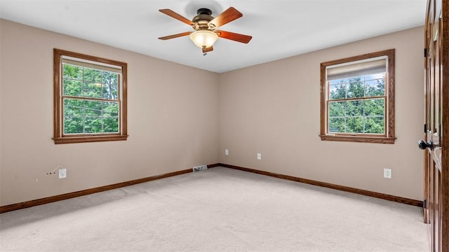 240 La Ray Dr, Center Twp But, PA 16001 - unfurnished room with light colored carpet, baseboards, and ceiling fan