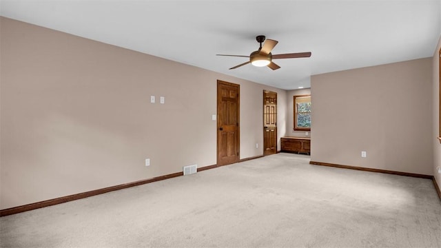 240 La Ray Dr, Center Twp But, PA 16001 - empty room featuring a ceiling fan, light carpet, and baseboards
