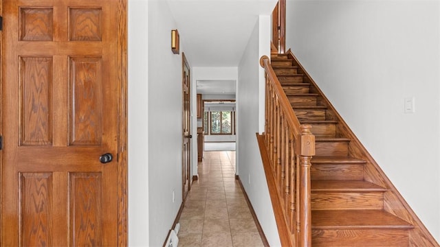 240 La Ray Dr, Center Twp But, PA 16001 - stairway featuring tile patterned floors and baseboards