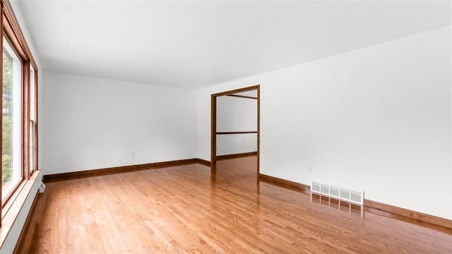 240 La Ray Dr, Center Twp But, PA 16001 - unfurnished room with light wood-style flooring, baseboards, and a baseboard heating unit