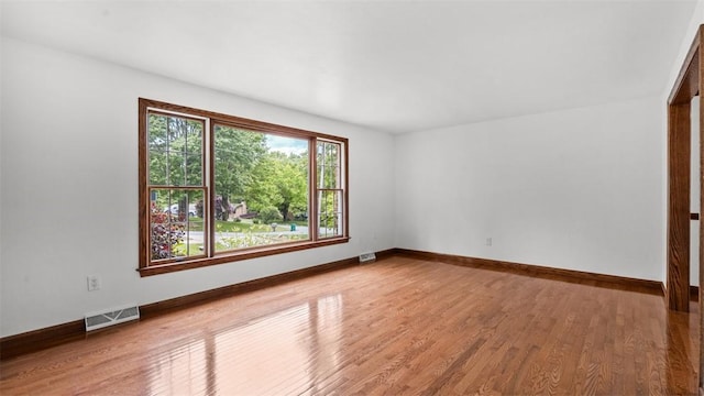 240 La Ray Dr, Center Twp But, PA 16001 - empty room with wood finished floors and baseboards