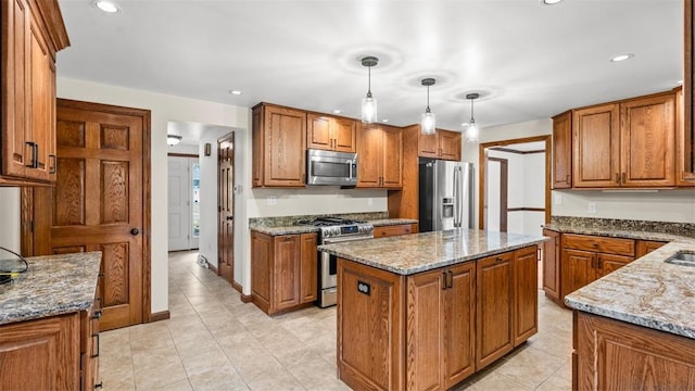 240 La Ray Dr, Center Twp But, PA 16001 - kitchen with appliances with stainless steel finishes, brown cabinets, and recessed lighting