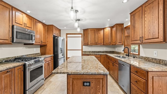 240 La Ray Dr, Center Twp But, PA 16001 - kitchen with stainless steel appliances, a sink, brown cabinets, and recessed lighting