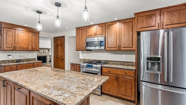 240 La Ray Dr, Center Twp But, PA 16001 - kitchen with appliances with stainless steel finishes, brown cabinets, recessed lighting, and light stone counters