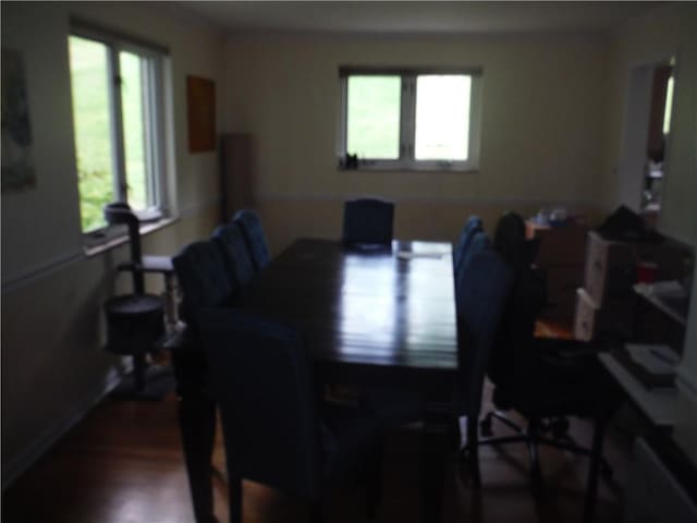 1260 Fox Chapel Rd, Fox Chapel, PA 15238 - dining room featuring healthy amount of natural light, dark wood finished floors, and baseboards