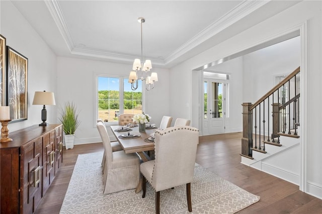 304 Azalea Ln, Marshall, PA 15005 - dining room with a chandelier, stairway, wood finished floors, a tray ceiling, and ornamental molding