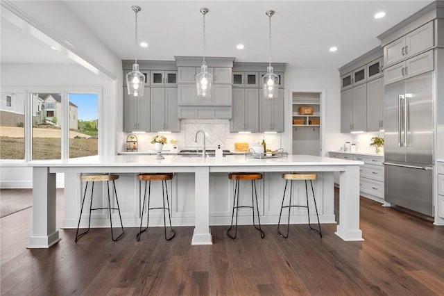 304 Azalea Ln, Marshall, PA 15005 - kitchen with stainless steel built in fridge, gray cabinetry, backsplash, a spacious island, and dark wood-type flooring
