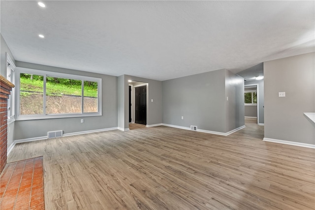 100 Old Legionville Rd, Economy, PA 15005 - unfurnished room featuring wood finished floors, plenty of natural light, baseboards, and recessed lighting