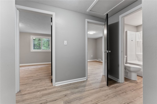 100 Old Legionville Rd, Economy, PA 15005 - hall with wood finished floors, baseboards, and attic access