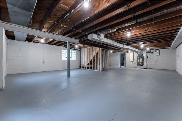 100 Old Legionville Rd, Economy, PA 15005 - below grade area featuring heating unit, stairway, and concrete block wall