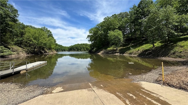 148 Rummel Rd, Bethel Twp, PA 16226 - dock area featuring a boat ramp, a water view, and a wooded view