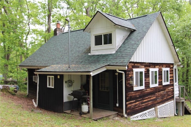 116 Camp Ln, Ligonier Twp, PA 15658 - view of front facade with a shingled roof and a chimney