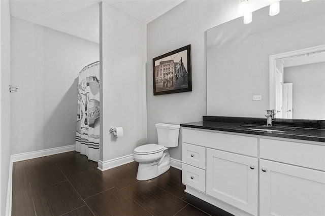 197 Wellington Cir, Peters Twp, PA 15317 - bathroom with baseboards, vanity, toilet, wood finished floors, and curtained shower