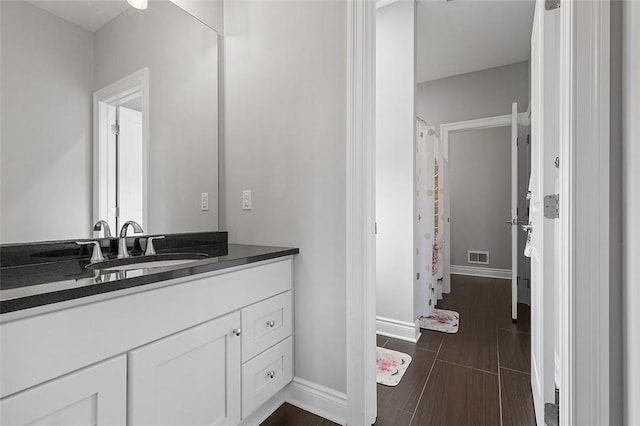 197 Wellington Cir, Peters Twp, PA 15317 - full bathroom with vanity, baseboards, and wood tiled floors