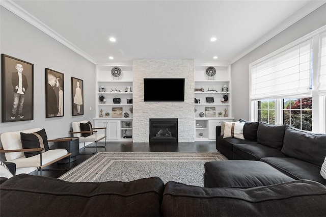 197 Wellington Cir, Peters Twp, PA 15317 - living room with ornamental molding, dark wood-style flooring, built in shelves, a fireplace, and recessed lighting