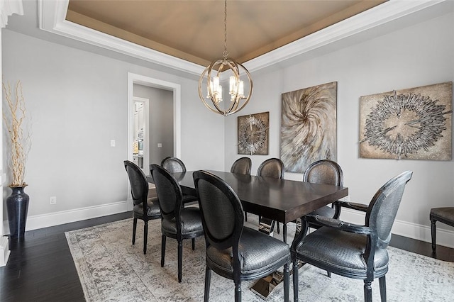 197 Wellington Cir, Peters Twp, PA 15317 - dining space featuring a raised ceiling, a chandelier, and baseboards