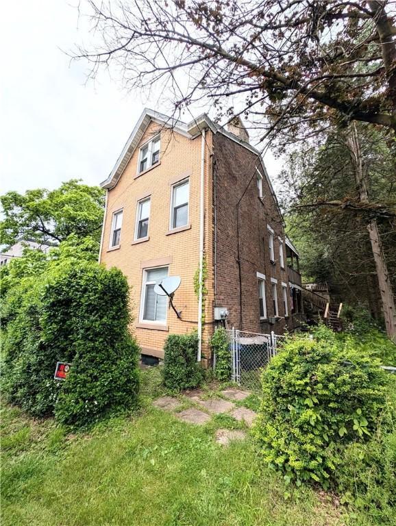 3200 Central Ave, Marshall Shadeland, PA 15212 - view of side of home with brick siding and a chimney