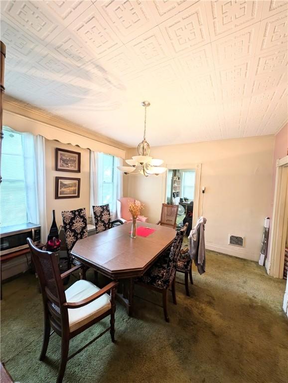 3200 Central Ave, Marshall Shadeland, PA 15212 - dining area with a chandelier and carpet floors