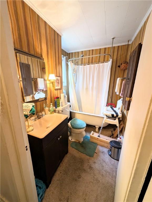3200 Central Ave, Marshall Shadeland, PA 15212 - full bath with vanity, toilet, shower / bath combo with shower curtain, wooden walls, and crown molding