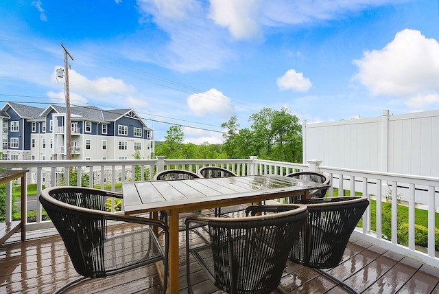 304 Spruce Ln, North Strabane, PA 15317 - wooden deck with outdoor dining area and a residential view