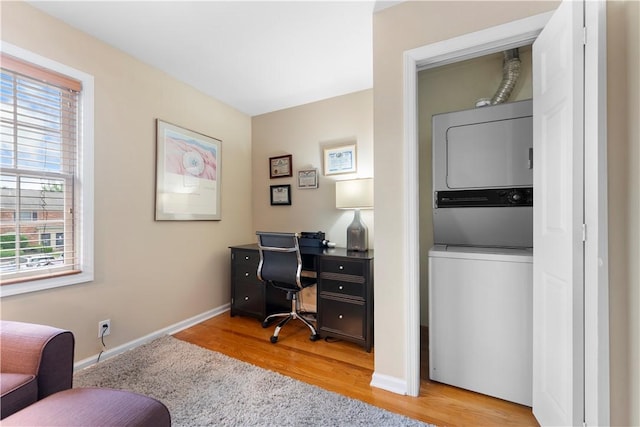 140 Jamestown Ct, Scott Twp Sal, PA 15216 - office with stacked washer / dryer, light wood-type flooring, and baseboards