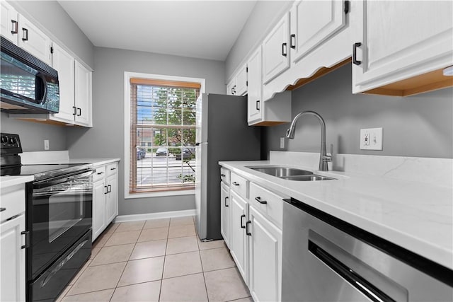 140 Jamestown Ct, Scott Twp Sal, PA 15216 - kitchen featuring black appliances, a sink, beverage cooler, light countertops, and white cabinetry