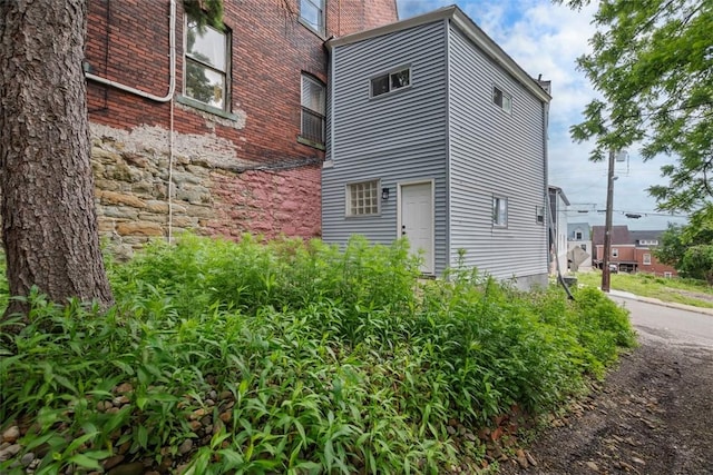 5437 Rosetta St, Garfield, PA 15206 - view of side of property featuring a chimney