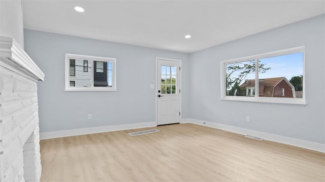 5437 Rosetta St, Garfield, PA 15206 - foyer entrance featuring light wood-style flooring and recessed lighting