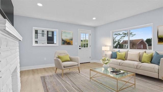 5437 Rosetta St, Garfield, PA 15206 - living room featuring wood finished floors and recessed lighting