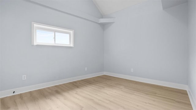 5437 Rosetta St, Garfield, PA 15206 - unfurnished room featuring light wood-style floors and vaulted ceiling