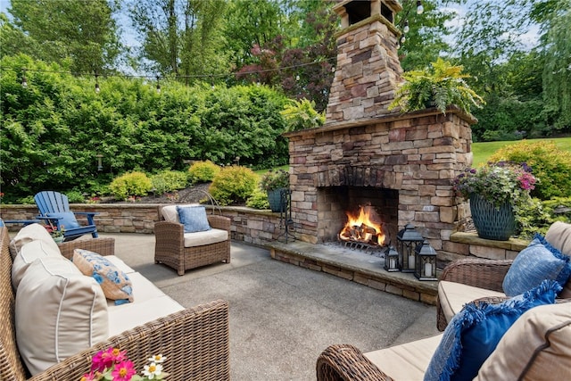 254 Orchard Dr, Mt Lebanon, PA 15228 - view of patio with an outdoor living space with a fireplace and view of wooded area