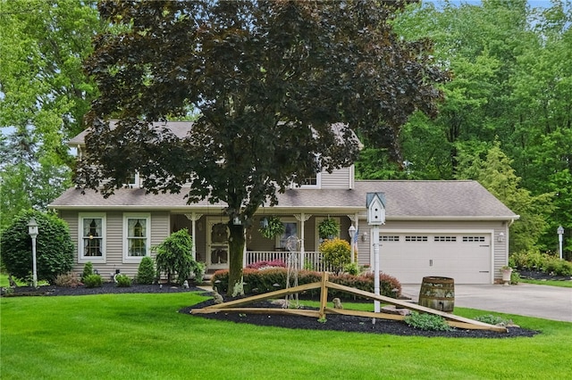150 Greenfield Rd, Neshannock Twp, PA 16105 - view of front facade with an attached garage, driveway, a front lawn, and a porch