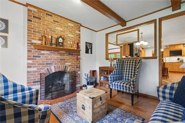 150 Greenfield Rd, Neshannock Twp, PA 16105 - living area with light wood-type flooring, crown molding, a fireplace, baseboards, and beamed ceiling