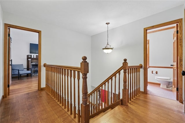 150 Greenfield Rd, Neshannock Twp, PA 16105 - hall with an upstairs landing, wood finished floors, and baseboards