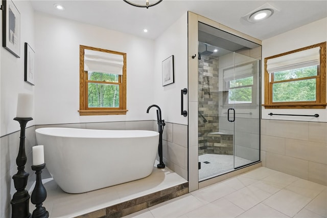 150 Greenfield Rd, Neshannock Twp, PA 16105 - full bath with a freestanding tub, a stall shower, recessed lighting, and tile patterned floors