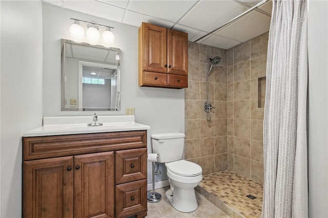 150 Greenfield Rd, Neshannock Twp, PA 16105 - full bathroom featuring toilet, tiled shower, vanity, a drop ceiling, and tile patterned floors
