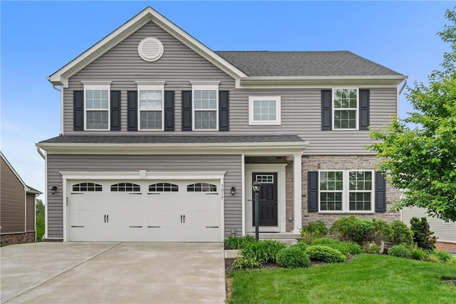 3017 Pelican Dr, Middlesex Twp, PA 16059 - view of front of home with an attached garage, driveway, a front yard, and a shingled roof