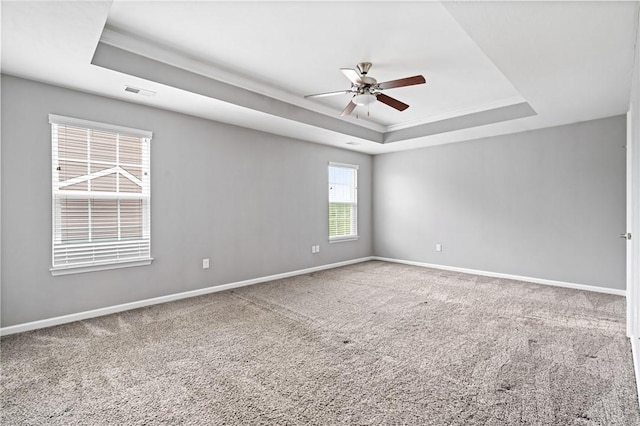 3017 Pelican Dr, Middlesex Twp, PA 16059 - empty room featuring a raised ceiling, a ceiling fan, baseboards, carpet flooring, and crown molding