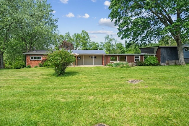 506 E End Road Ext, Bullskin Twp, PA 15425 - rear view of property with a yard