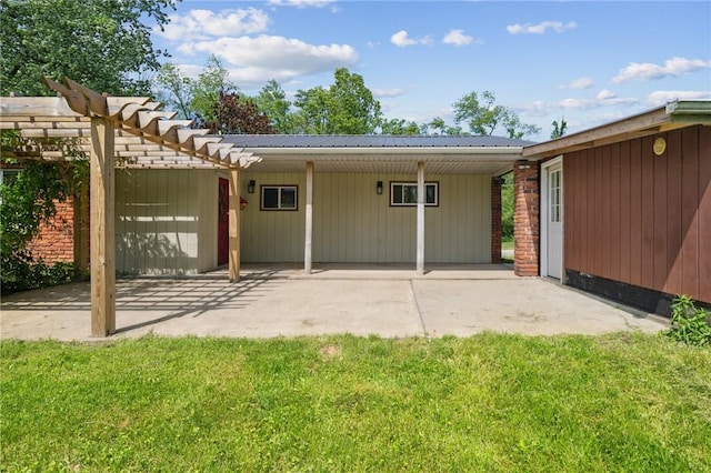 506 E End Road Ext, Bullskin Twp, PA 15425 - rear view of house with a lawn and metal roof