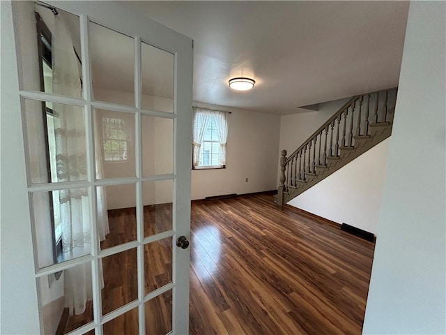 319 Wahl Ave, Evans City Boro, PA 16033 - foyer entrance featuring wood finished floors, stairs, and baseboards