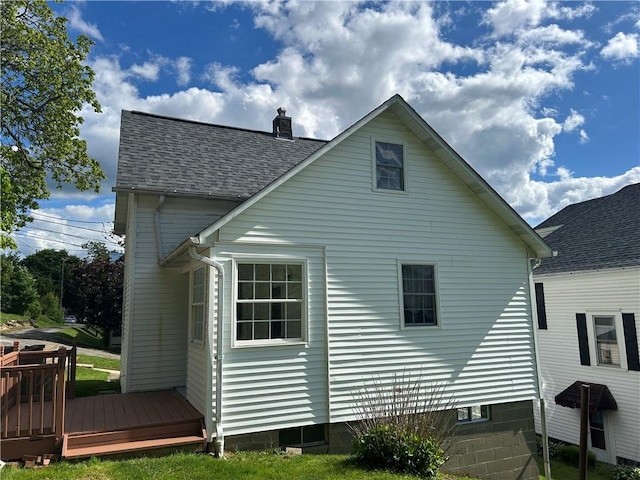 319 Wahl Ave, Evans City Boro, PA 16033 - back of house with a wooden deck, a chimney, and a shingled roof