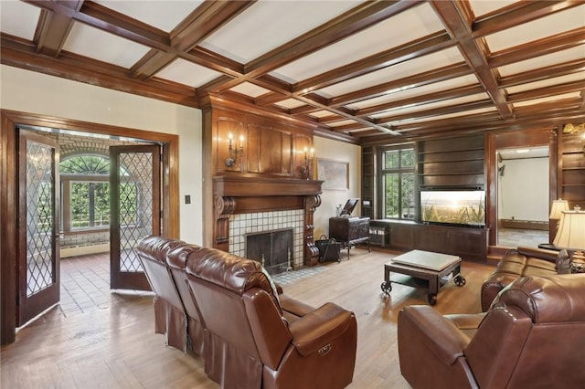 421 E Moody Ave, New Castle/2Nd, PA 16105 - living area featuring a tile fireplace, coffered ceiling, a baseboard heating unit, plenty of natural light, and beamed ceiling