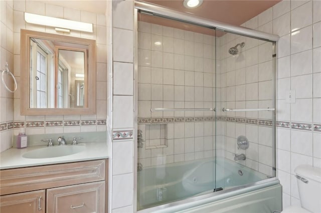 421 E Moody Ave, New Castle/2Nd, PA 16105 - full bathroom featuring tile walls, combined bath / shower with glass door, vanity, toilet, and tasteful backsplash