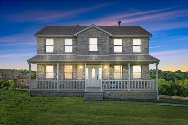 3405 Grandview Rd, Perry Twp Law, PA 16117 - view of front of property featuring a porch, a lawn, brick siding, and roof with shingles