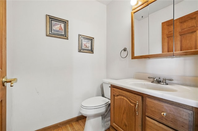 3405 Grandview Rd, Perry Twp Law, PA 16117 - bathroom featuring vanity, wood finished floors, toilet, and baseboards
