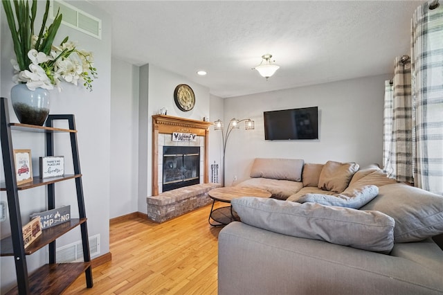 3405 Grandview Rd, Perry Twp Law, PA 16117 - living area with a brick fireplace, wood finished floors, baseboards, and recessed lighting