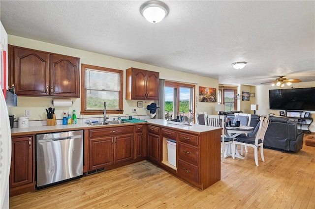 3405 Grandview Rd, Perry Twp Law, PA 16117 - kitchen with dishwasher, a sink, a peninsula, light countertops, and a textured ceiling