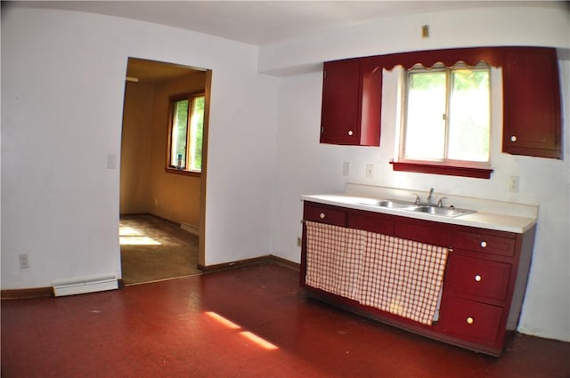 395 Dermond Rd, Hermitage, PA 16148 - kitchen with a baseboard heating unit, a sink, light countertops, and baseboards