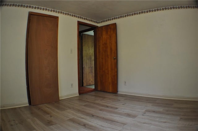 395 Dermond Rd, Hermitage, PA 16148 - unfurnished bedroom with wood finished floors and baseboards